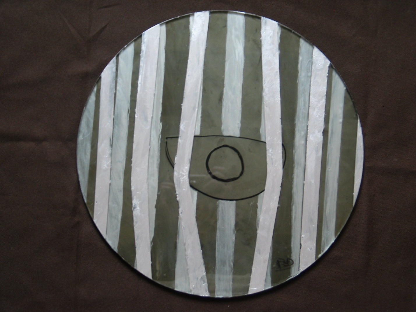 Understanding — minimalist composition on a circular pane of glass with vertical silver bars and a schematic eye at center